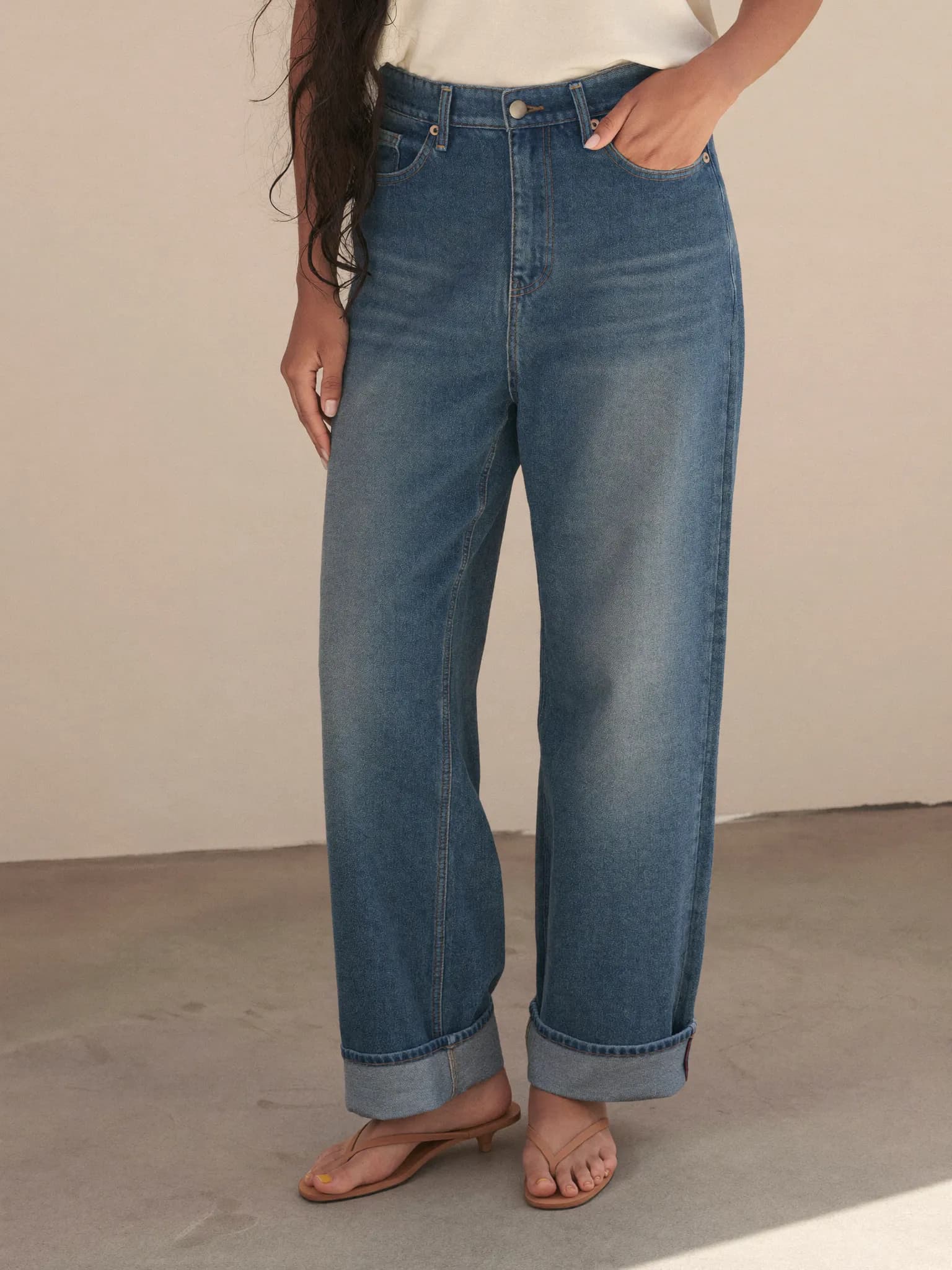 Model wearing the Vintage Blue Barrel-Leg Jeans.