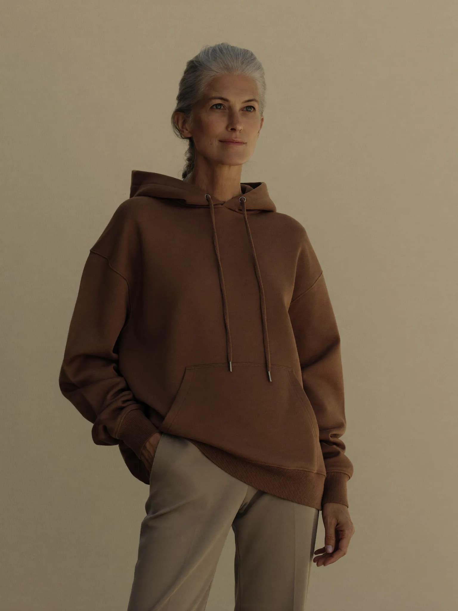 Model wearing the Cocoa Boxy Hoodie.