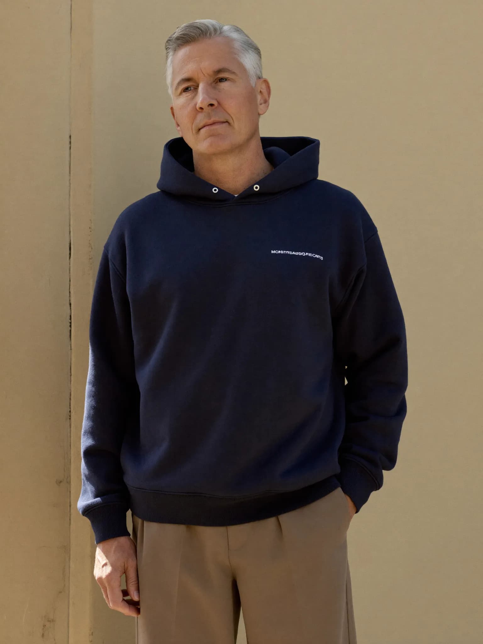 Model wearing the Navy Full-Zip Hoodie.