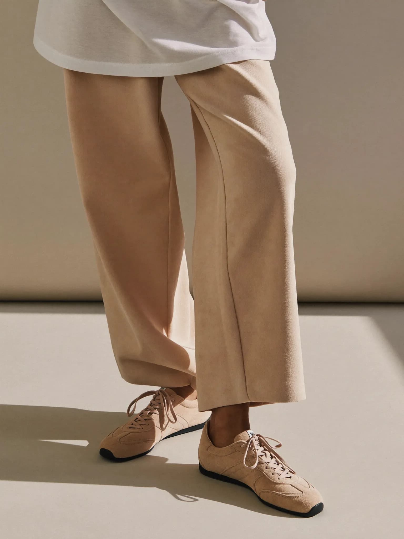 Model wearing the Blush Suede Runner.